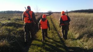 hunters walking on trail